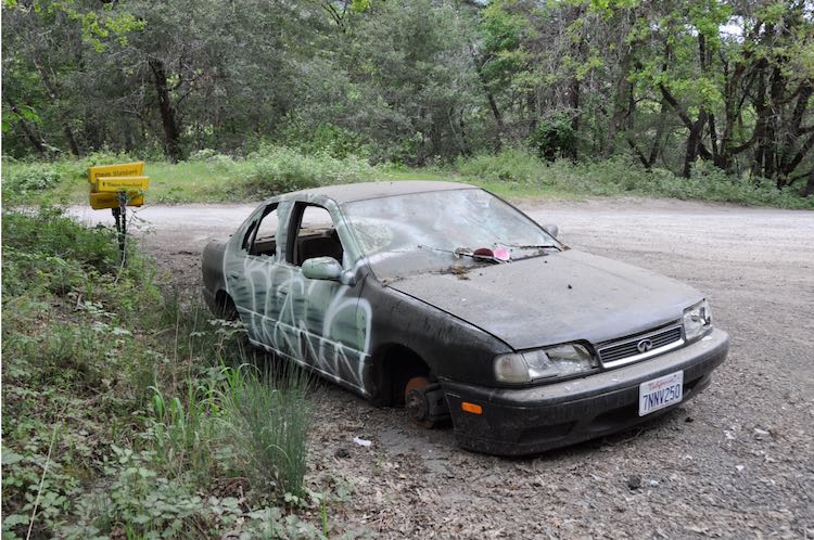 An abandoned car near Miranda, photo by Kym Kemp.