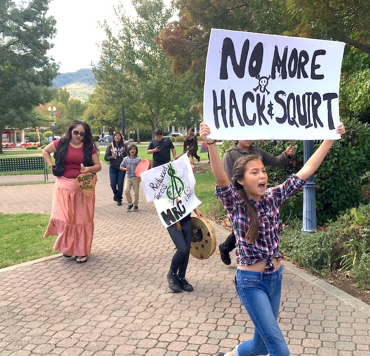 "Let Our Forest Heal" marchers head from Alex Thomas Plaza to the Mendocino Redwood Company in Ukiah after completing a four day trek from Comptche to raise awareness of "hack and squirt" practices.