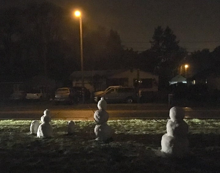 A family of snowmen under the stars on Highway 20 just west of Highway 101 in Willits.