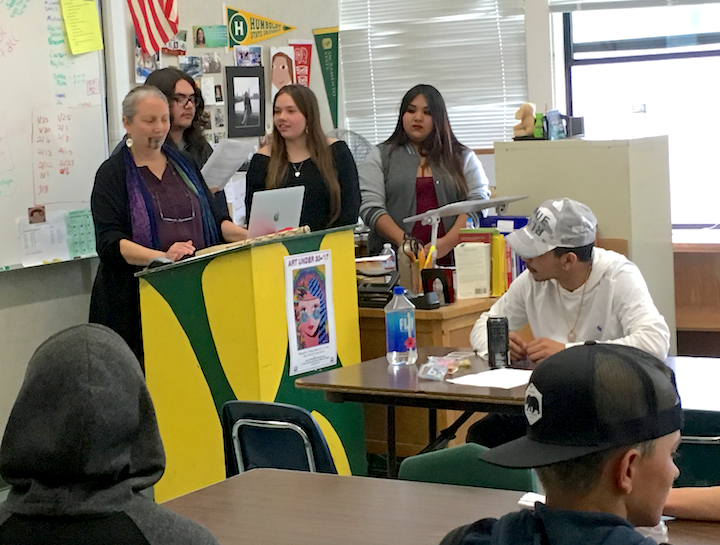 Round Valley Wailaki language teacher and Dreamstarter recipient Cheryl Tuttle with students Walter Card, Shayleena Britton, and Lourdes Downey talking to students at Willits High School this March.