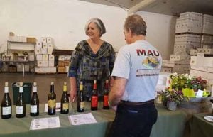 Barbara Reber talking wine at Graziano with a visitor.