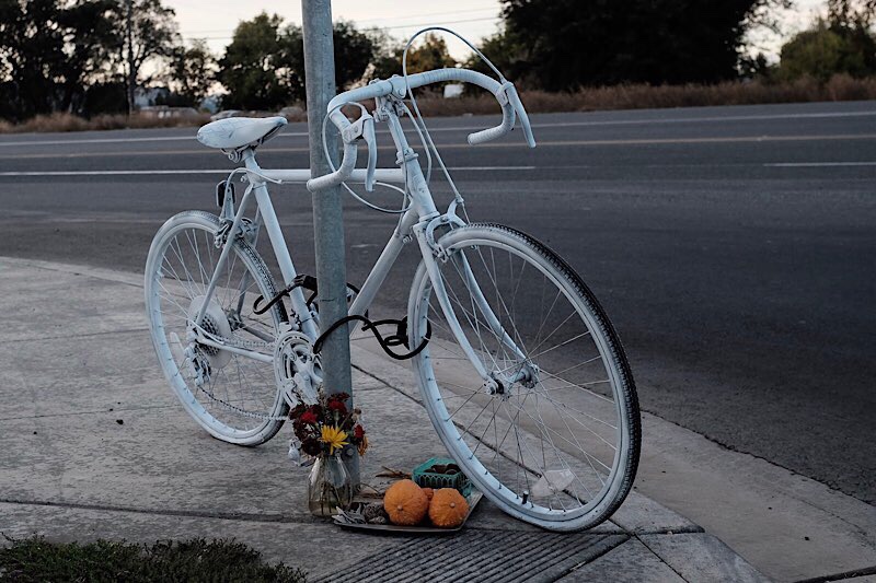 offerings left at the ghost bike commemorating the cyclist who was killed
