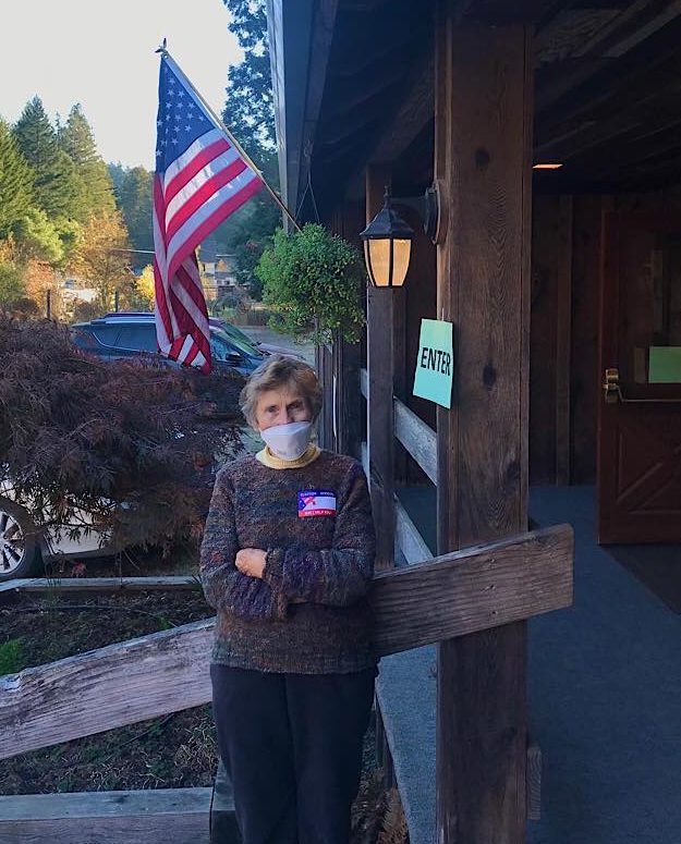 Jeannie, 87 years old has been volunteering as a poll watcher for over 20 years. This year, two grandkids joined her on the job. She said she volunteers to make sure the voting process goes smoothly and to spend time with her family and friends. (Lana Cohen / Mendocino Voice)