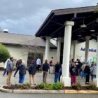 People line up outside the Adventist Health Ukiah Valley Medical Center to get a Moderna COVID-19 vaccination, during an emergency vaccine drive. (Jethro Bowers / The Mendocino Voice)