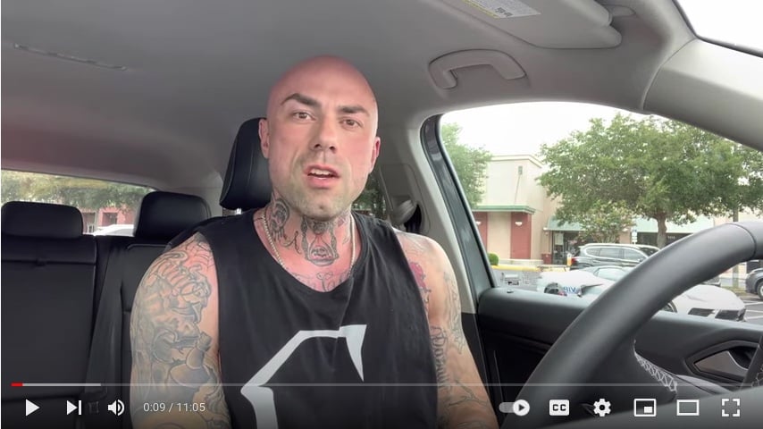 A YouTube screencap of Trent James in his car speaking to the camera.
